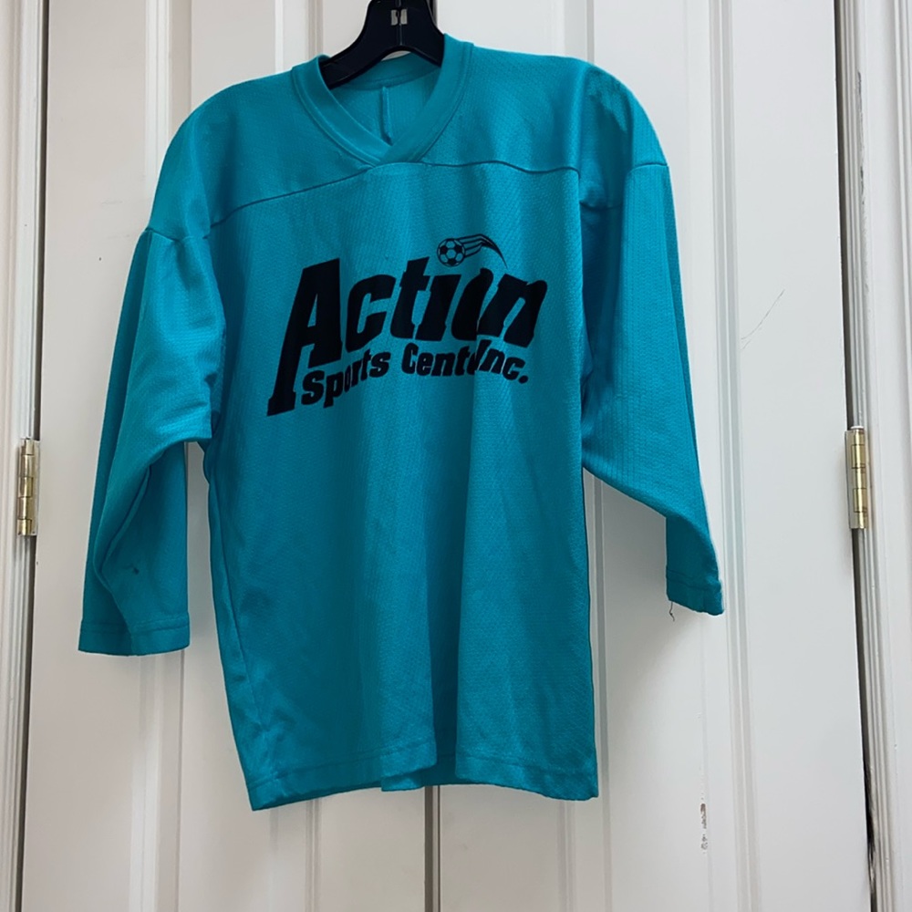 Action sports center soccer jersey